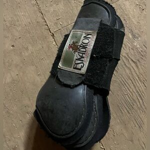 Large Open Front boots used comes with hind set